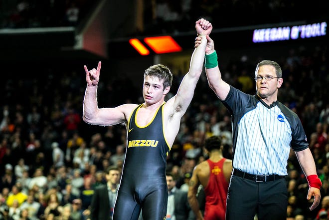 Missouri's Keegan O'Toole is introduced as the winner over top-seeded David Carr in the 165-pound chamipion Saturday at the NCAA championships at BOK Center in Tulsa, Okla. O'Toole, a four-time Wisconsin state champion at Arrowhead High School, also won in 2022.