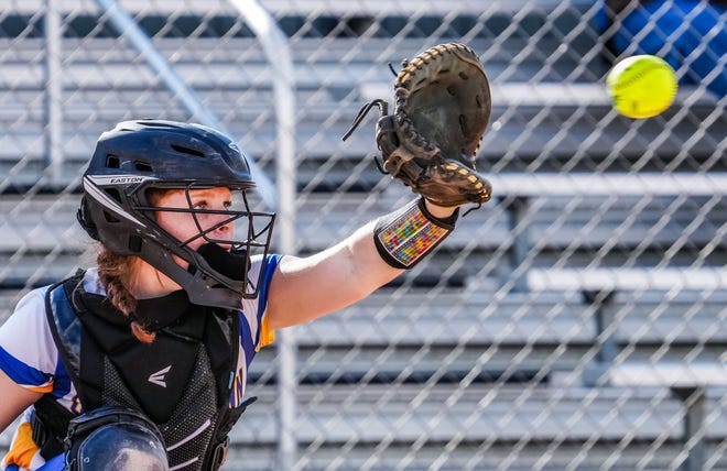 Germantown catcher Kennedy Bennett (4) waits on a pitch during the game at home against Brookfield East, Tuesday, April 23, 2024.